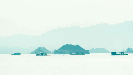 Commercial boat cruising Mahakam river, Samarinda in the morning. Traffic at Mahakam river.の写真素材