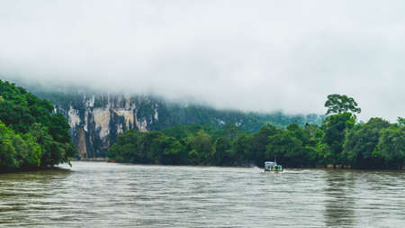 Batu Dinding, iconic landscape of limestone wall on the upper Mahakam riverbank. Beautiful landscape of karst on the riverbankの写真素材