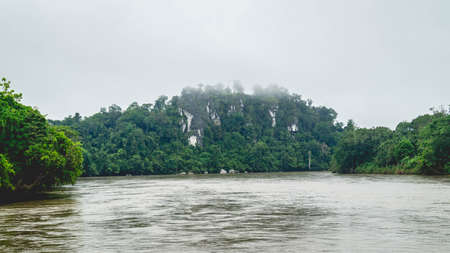 Batu Dinding, iconic landscape of limestone wall on the upper Mahakam riverbank. Beautiful landscape of karst on the riverbankの写真素材