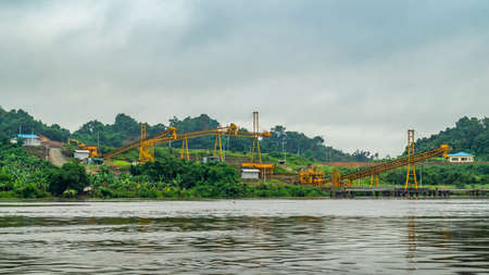 Huge conveyor at Mahakam Riverbank used to load coal to the barge. Industrial and mining backgroundの写真素材
