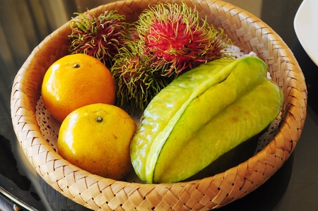 Tropical fruit - Rambutan, Orange, Star fruitの写真素材