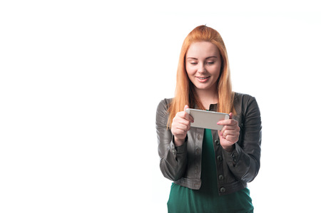 Beautiful woman playing on your smartphone