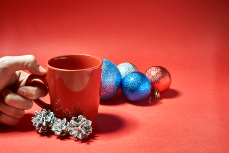 coffee mug on a red backgroundの写真素材