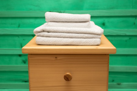 chest of drawers with a clean towelの写真素材