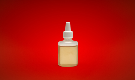 Brown medicine bottle on a backgroundの写真素材