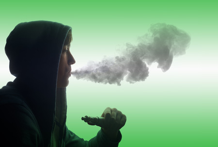 man smoking e-cigarette