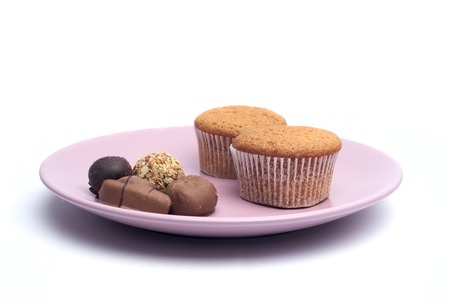 Dish with candy and cupcakeの写真素材