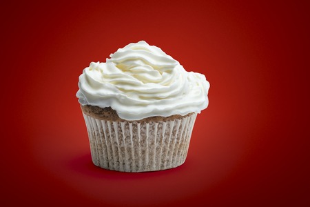 cupcake with cream on isolated backgroundの写真素材
