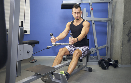A man trains, shakes his back