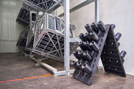 Premises for production, factory, rack with bottles of wineの写真素材