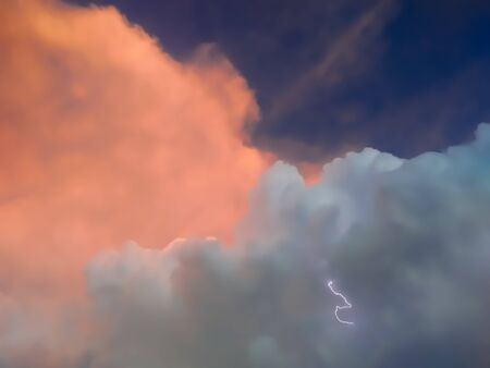 Beginning of Thunderstorm lightning - tiny thunder lighting with clouds around in the evening