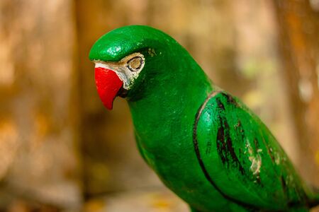 Parrot doll made of cement used in a decoration of park of Bangladesh