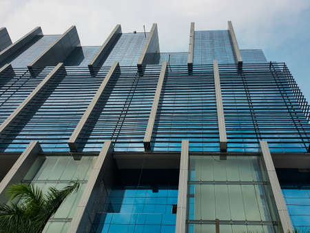 Tall commercial building in the capital of Bangladesh, Dhaka. Commercial building with glass front