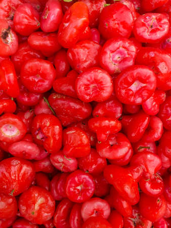 Jamrul - stack of Fresh ripe red water apple or malay apple or wax apple displayed beautifully. Red water apple or Jamrulの写真素材