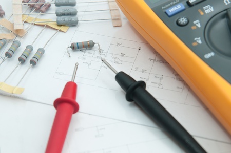Checking Circuit by Multi-Meter. Electrical Engineer on during checking circuit board unit by...