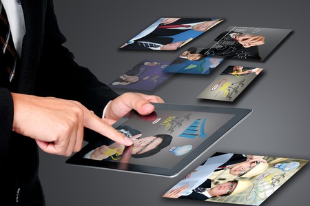 Businessman on touch padの写真素材