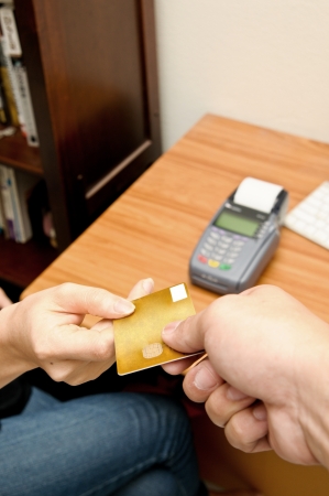 Close up Payment machine on during using Credit card from customer in shopping mallの写真素材