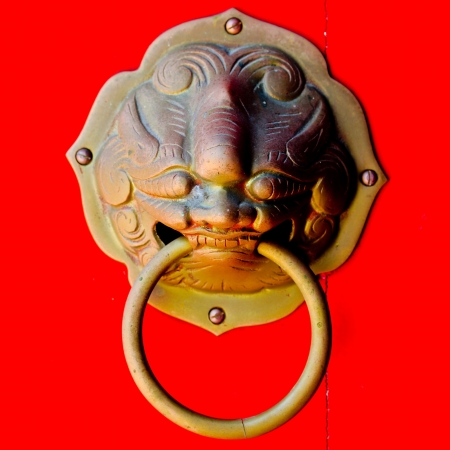 Lion knock door in Chinese temple