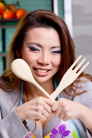 Close up woman preparing materail for do her food in the kitchenの写真素材