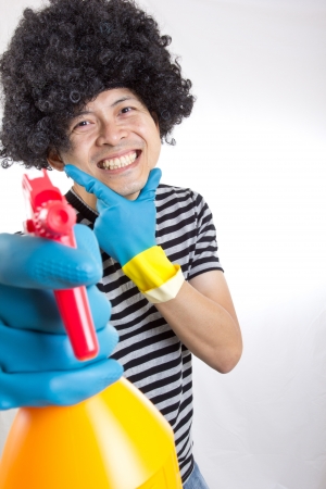portrait spay man for cleanning something in studioの写真素材