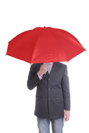 Businessman holding red umbrella with white backgroundの写真素材