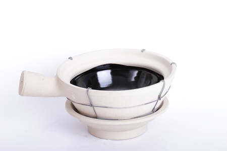 chinese clay pot with white backgroundの写真素材
