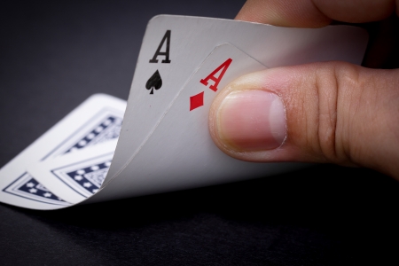 Hand open to see poker aces pair in Casinoの写真素材