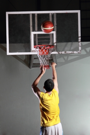 Basketball player prepare to shoot ball in the gameの写真素材