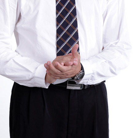 Close up businessman clapping his hands in the office