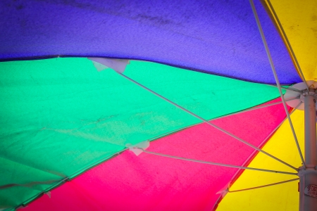 Close up multiple colorful umbrella with backgroundの写真素材