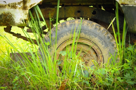 The old car damage park in wild  waiting for repairの写真素材