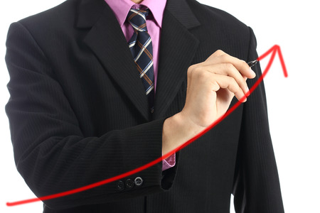Businessman write graph business for explain somethingの写真素材