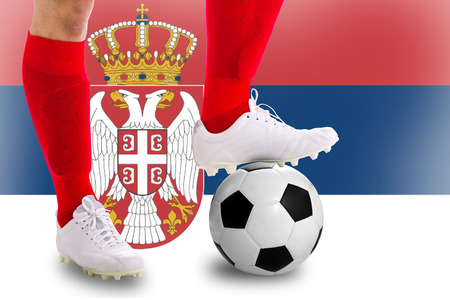 Serbia soccer player with football for competition in Match game.の写真素材
