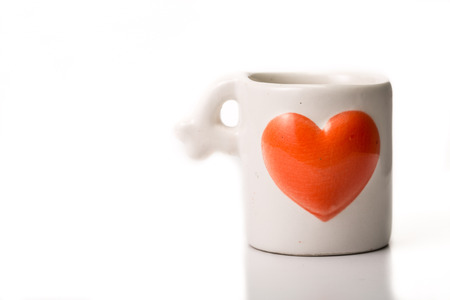 Heart coffee cup isolated with white backgroundの写真素材