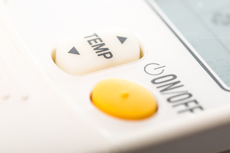 air condition remote isolated with white backgroundの写真素材