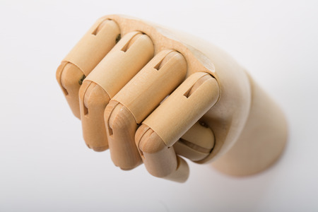 Wooden hand Point target to go on white backgroundの写真素材