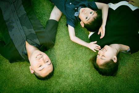 Asian Family portrait in sky garden outsideの写真素材