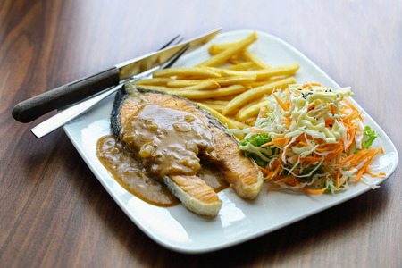Salmon steak food for lunch in hotelの写真素材