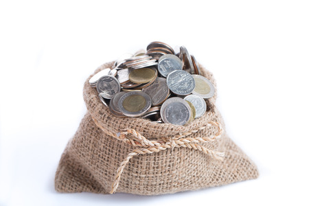 Money coin deposit for investment with white backgroundの写真素材