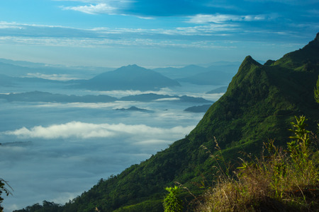 Mountain Pha Tang sunrise and mist in the morning Thailand.の写真素材