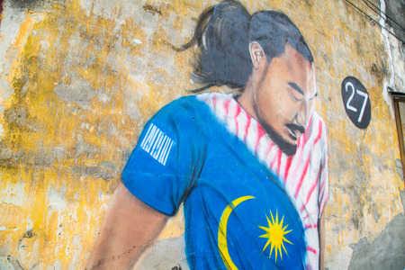 GEORGE TOWN,PENANG ,MALAYSIA- CIRCA March 26, 2015: Public street art Name 27 Football player on the wall by Local Artist in Georgetown, Penang, Malaysiaのeditorial素材