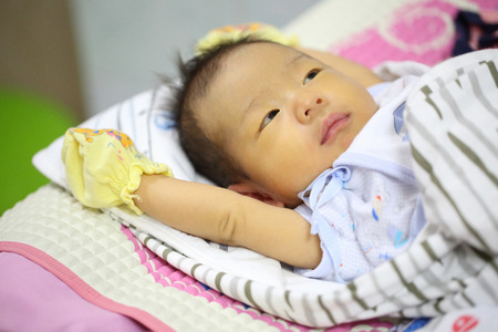 Smile Baby looking forward with white backgroundの写真素材