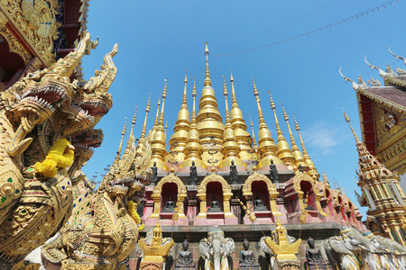 Thailand buddha statue with blue skyの写真素材