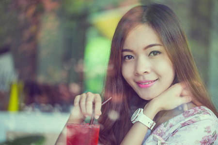 Portrait young adult post to photographer with Vintage toned colorの写真素材