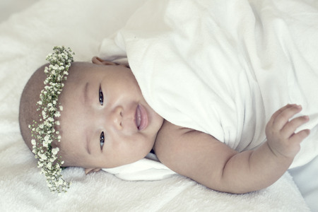 Sleeping Asian baby with white backgroundの写真素材