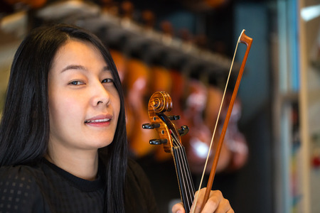 violinist playing violin musics in studio schoolの写真素材