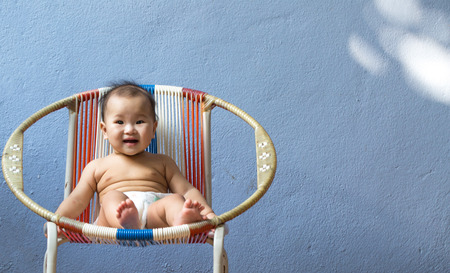 Sleeping Asian baby with white backgroundの写真素材