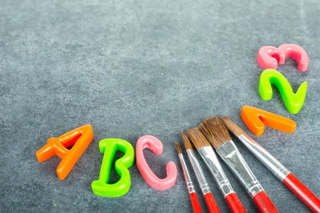 Back to school design blank with black board.の写真素材