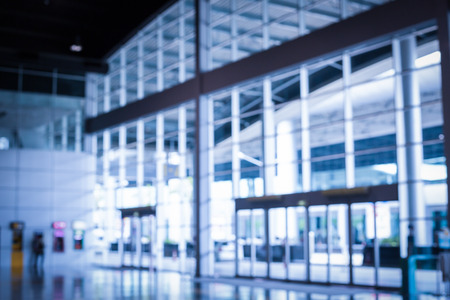 Office glass blur background in office building.の写真素材