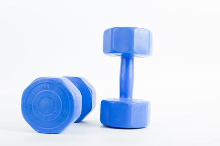 Dumbbell for building your body with white background.の写真素材